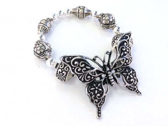 Silver Butterfly Barrel Bead Stretch Bracelet Silver Butterfly Barrel Bead Stretch Bracelet